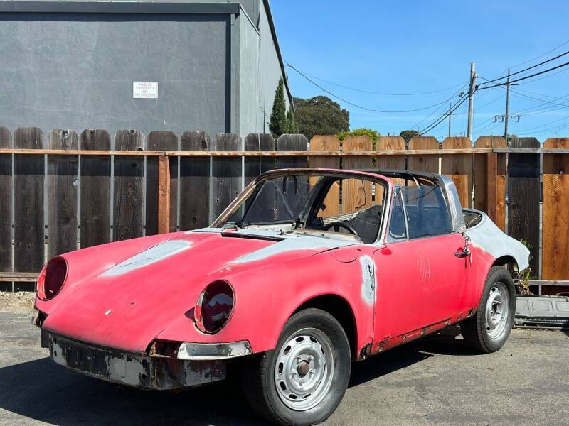Listing photo of a bare 1971 Porsche 911 shell offered with a title
