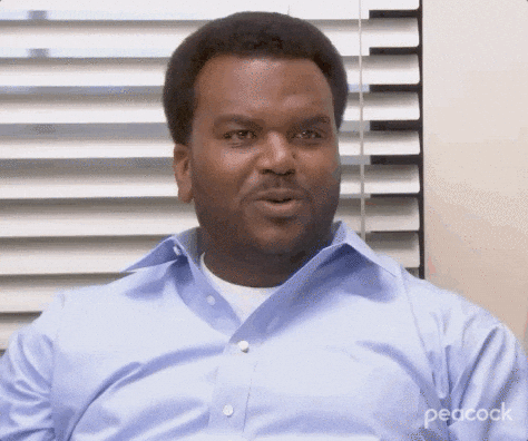 Darryl from The Office giving a skeptical, unconvinced side-eye
